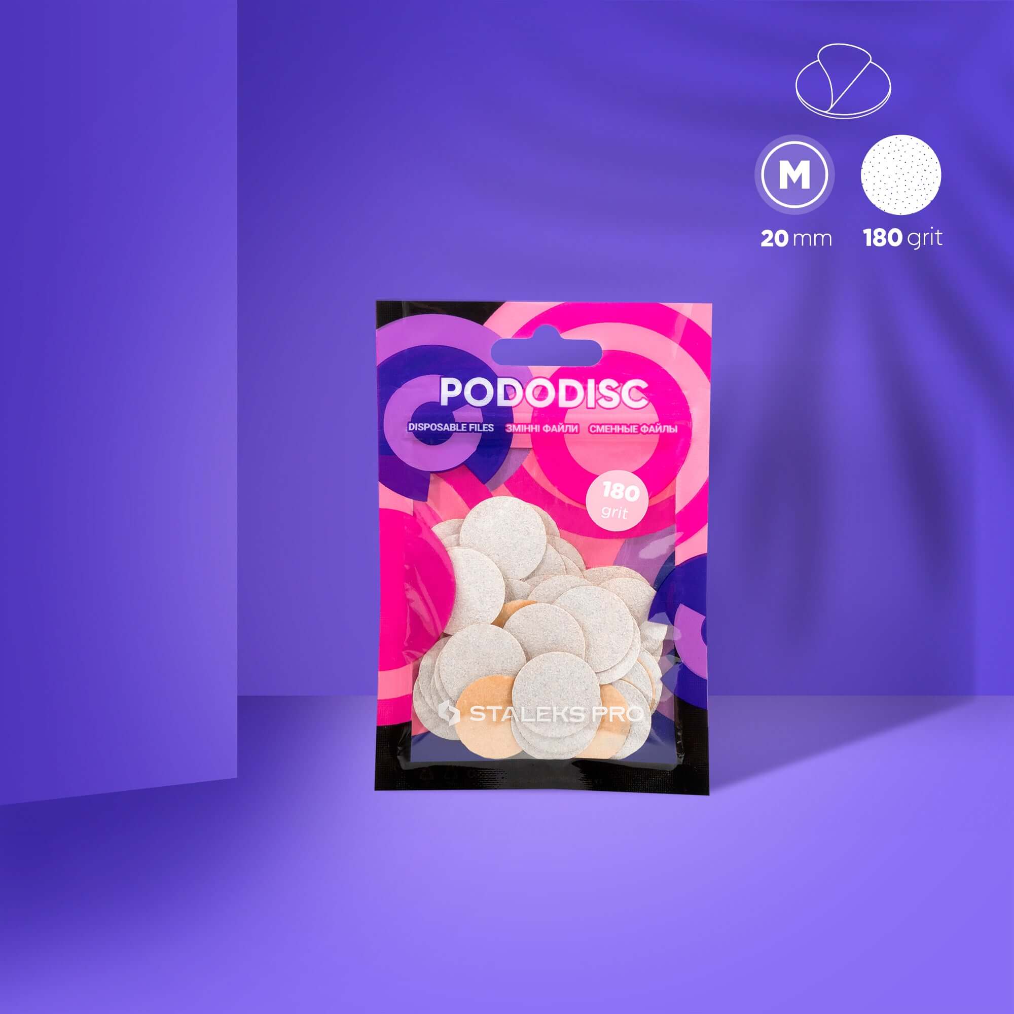 Резервни абразиви 180 за педикюрен диск PODODISC STALEKS PRO M (50 бр.) в пакет на лилав фон.