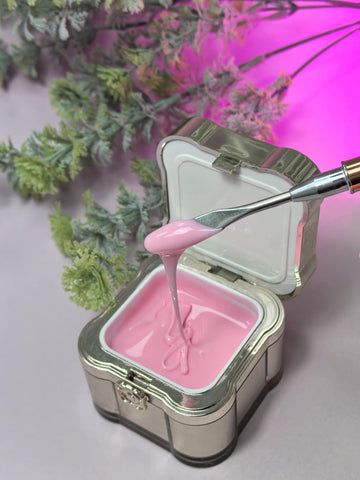Lemmy Builder Gel 07 - Persian Pink shown in an elegant container with a creamy texture perfect for nail strengthening and extension.