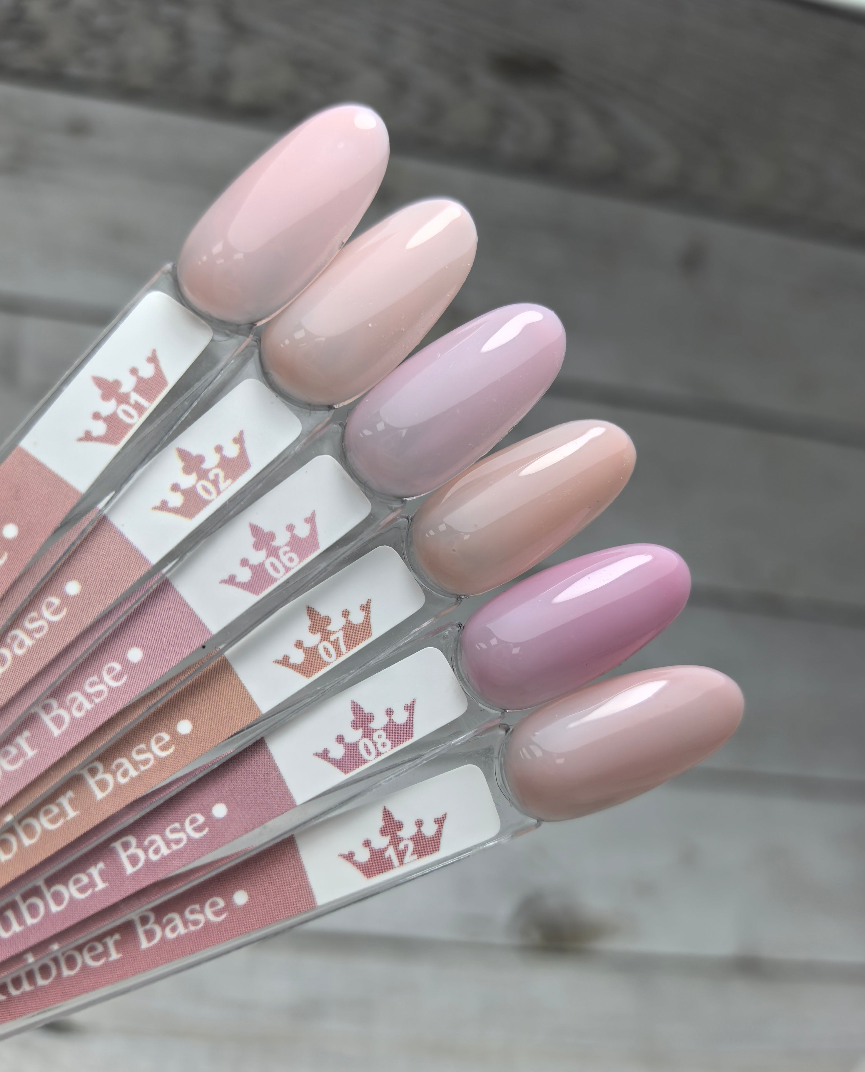 Nude Rubber Base 07 nail polish swatches showcasing medium viscosity and durable finish for hard or medium density nails.