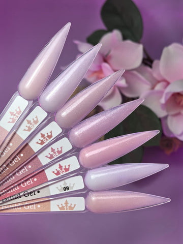 Shimmer Builder Gel 02 - Ocean Pearl 15ml nail swatches with pink and purple shades against a floral backdrop